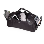 Black duffel bag with various items on a white background