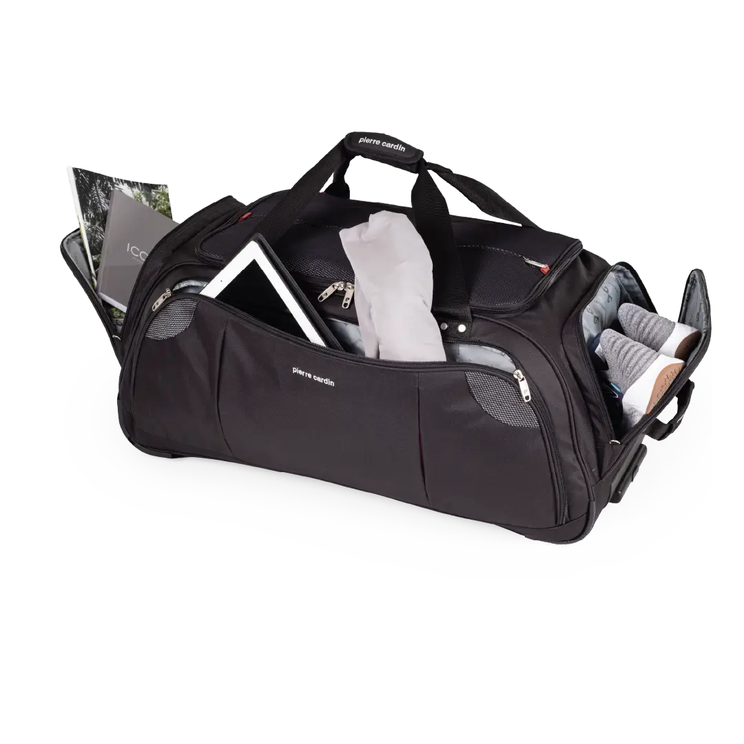 Black duffel bag with various items on a white background