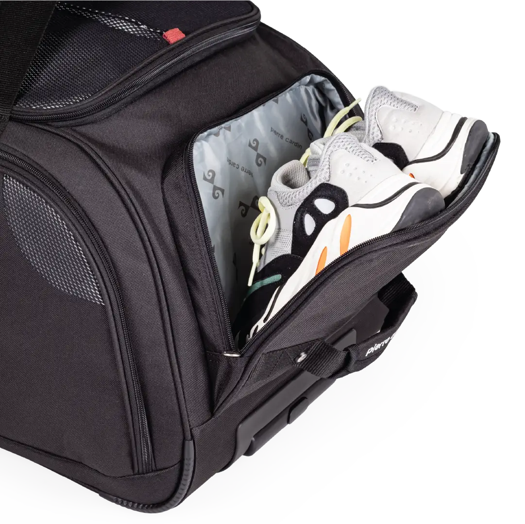 Black backpack with open compartment showing white sneakers inside