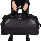 Black duffel bag with 'Pierre Cardin' branding held by a person on a white background