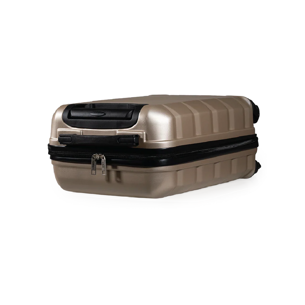 Beige suitcase with black accents on a white background