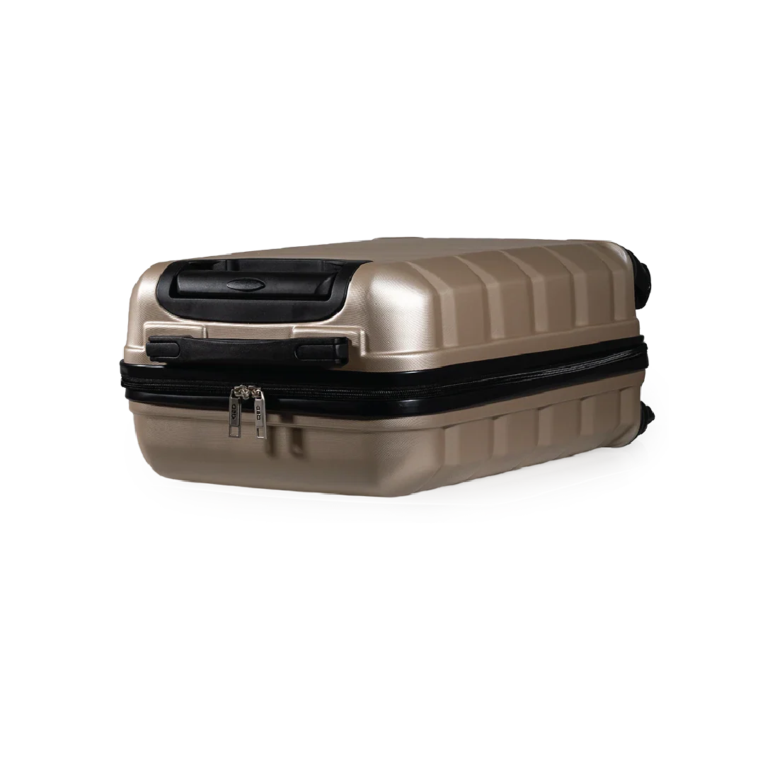 Beige suitcase with black accents on a white background