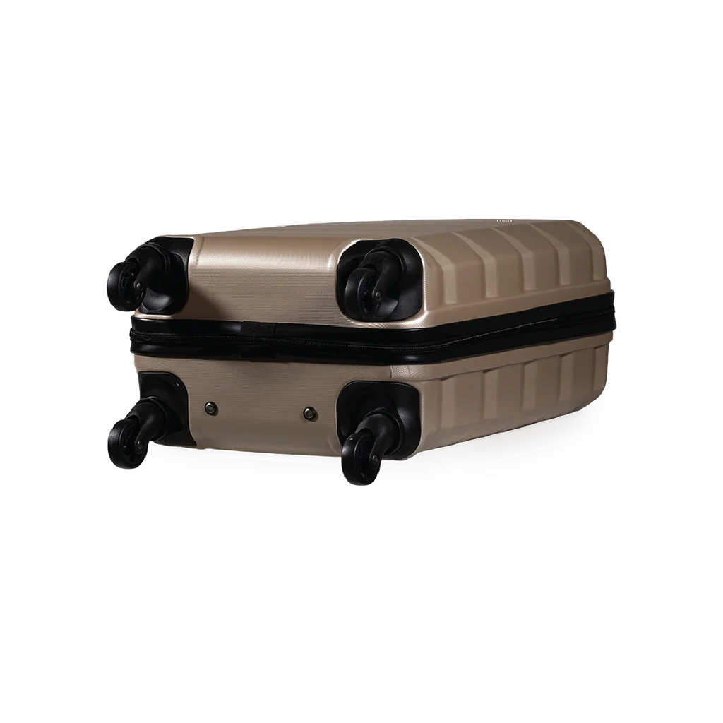 Beige and black suitcase on a white background