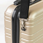 Beige suitcase with a black strap and zipper on a white background
