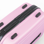 Pink suitcase bottom-view with zippers on a white background
