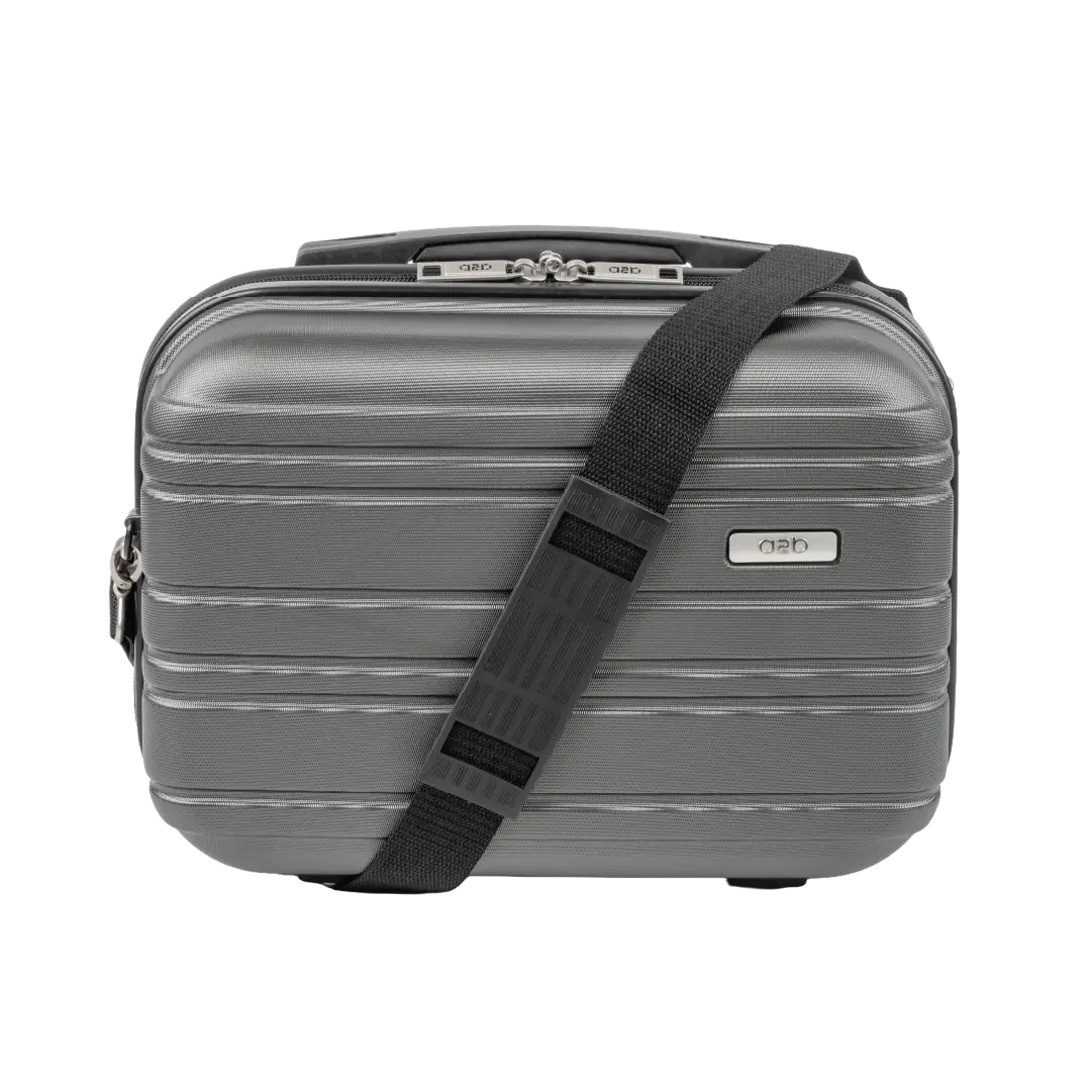 Gray suitcase with a black strap on a white background