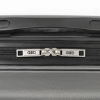 Close-up of a gray suitcase with a zipper and 'QED' branding.