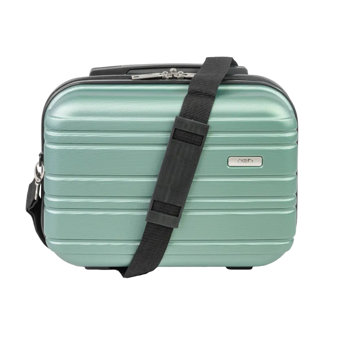 Mint green suitcase with a black strap on a white background