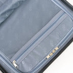 Suitcase with a zipper open, showing the interior.