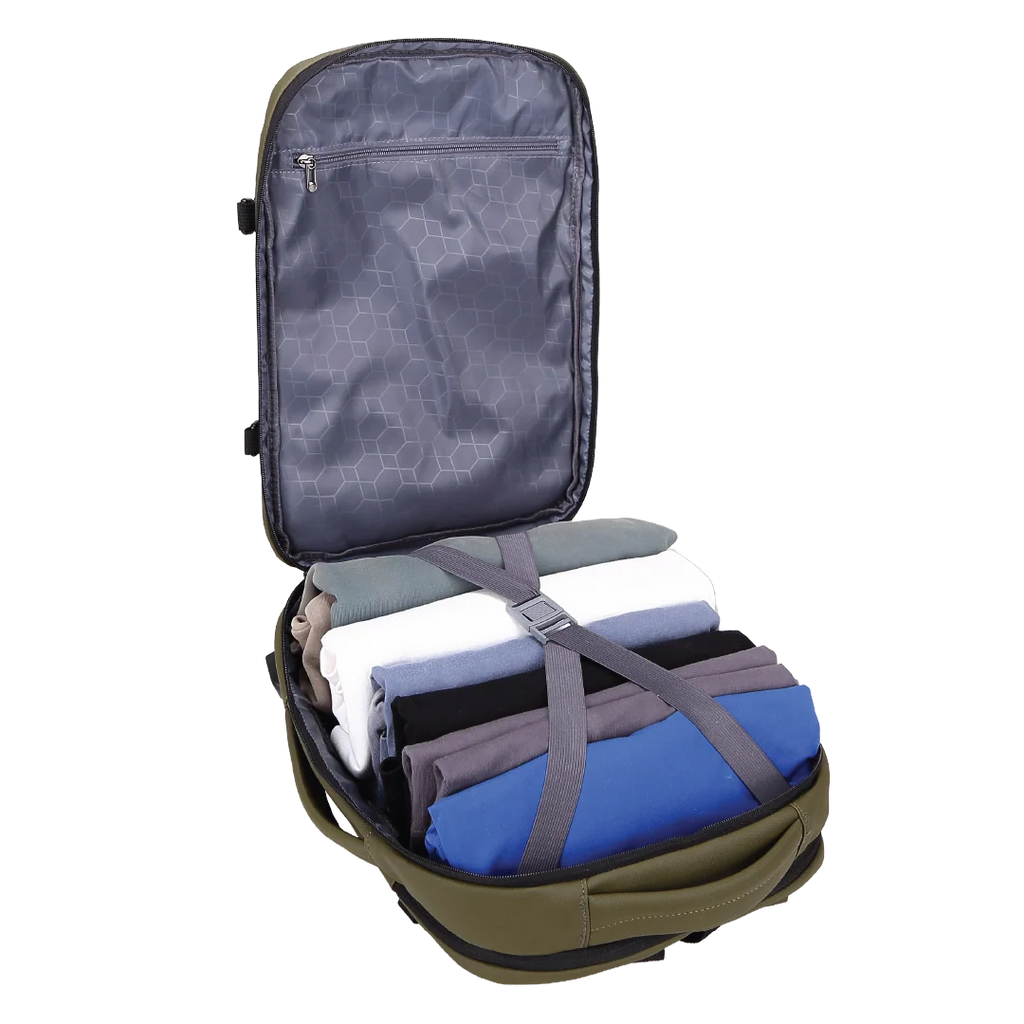 Open backpack with folded-up clothes inside on a white background