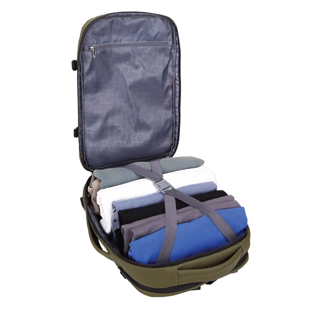 Open backpack with folded-up clothes inside on a white background