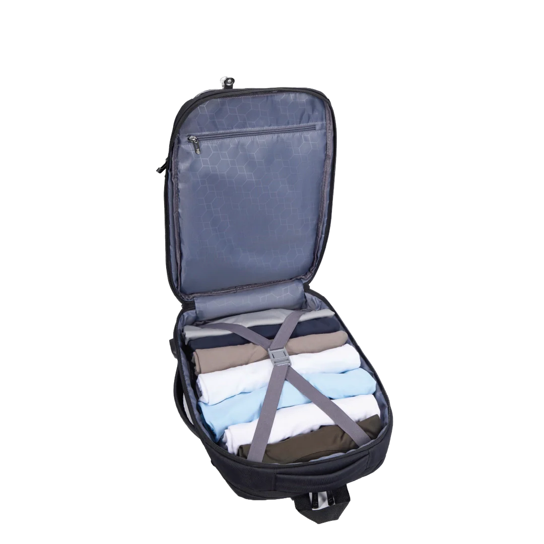 Open suitcase with folded clothes on a white background
