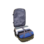 Backpack opened and filled with clothes secured by a strap.