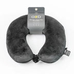 Gray travel neck pillow with a2b brand label on a white background