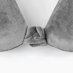 Gray towel with a button on a white background