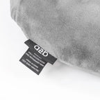 Gray pillow with a label on a white background