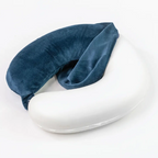 Blue travel neck pillow on a white background