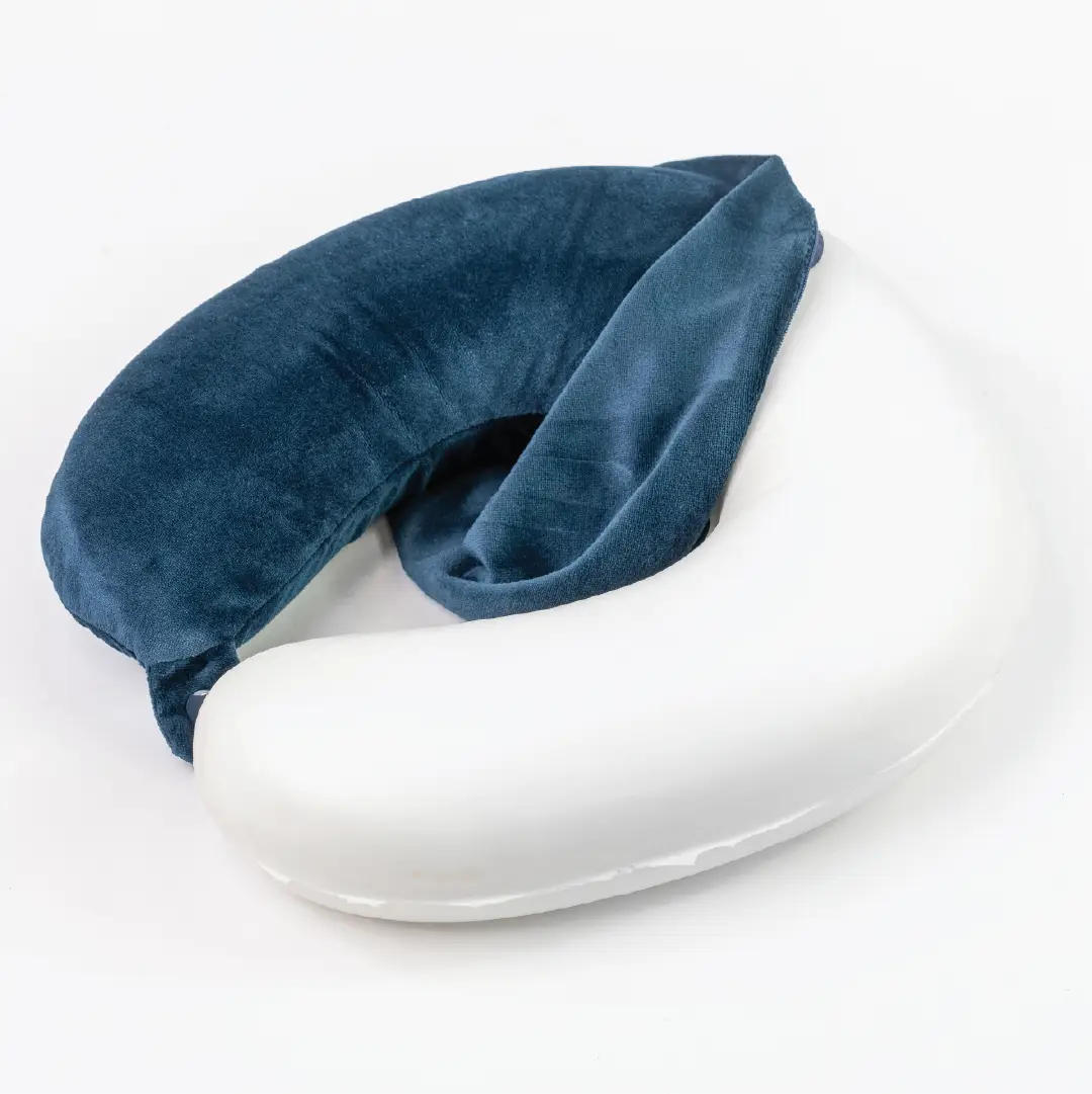 Blue travel neck pillow on a white background