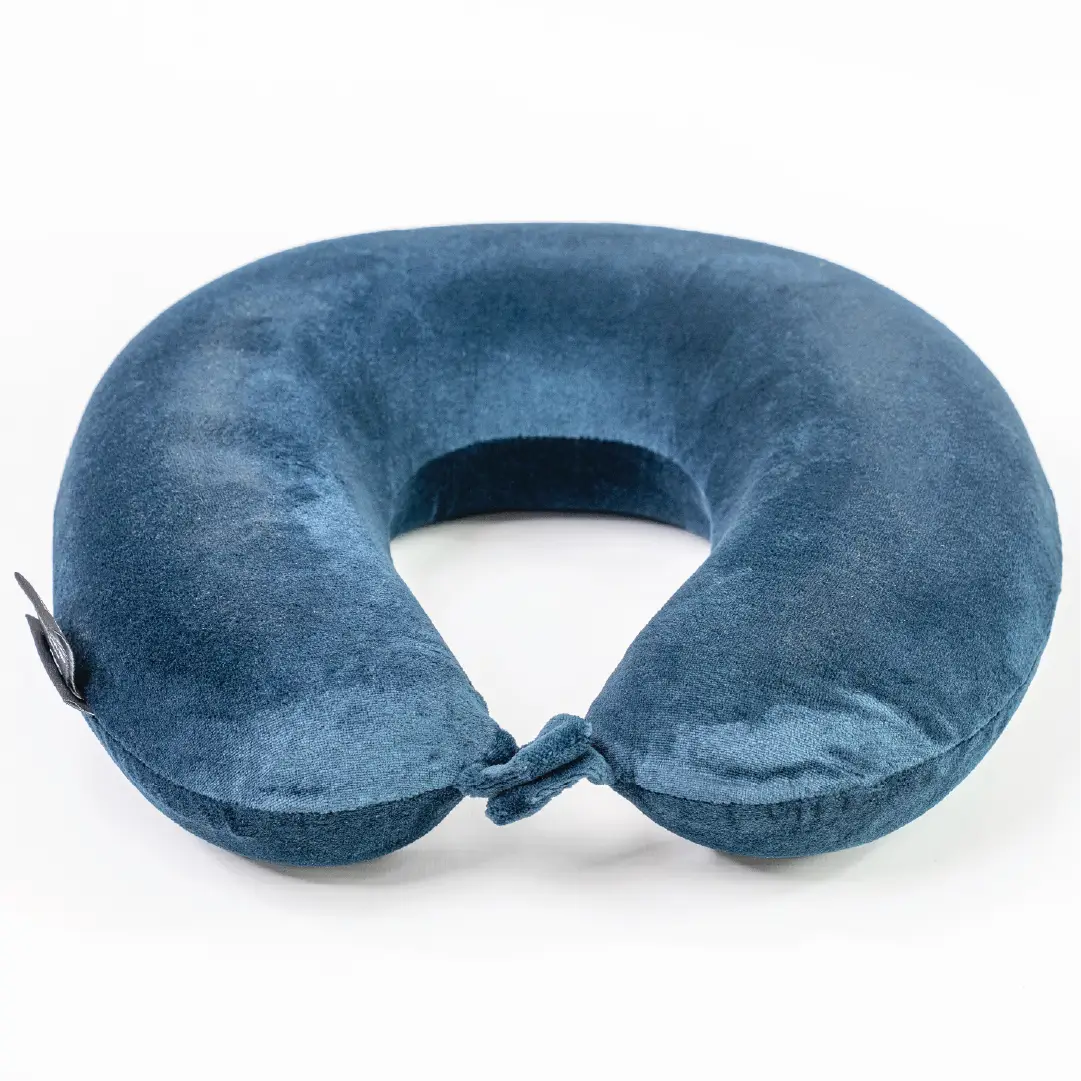 Blue travel neck pillow on a white background