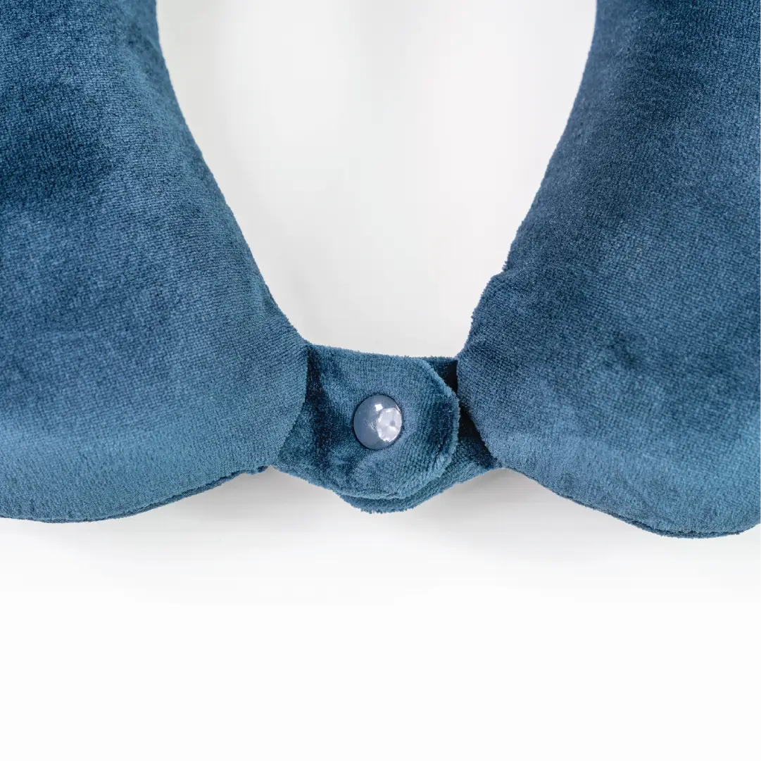 Blue velvet collar with a button on a white background