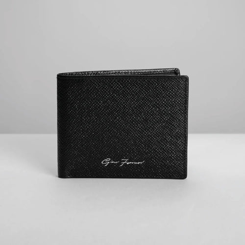Black textured wallet with branding on a light gray background