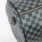 Checkered patterned bag with a zipper on a white background
