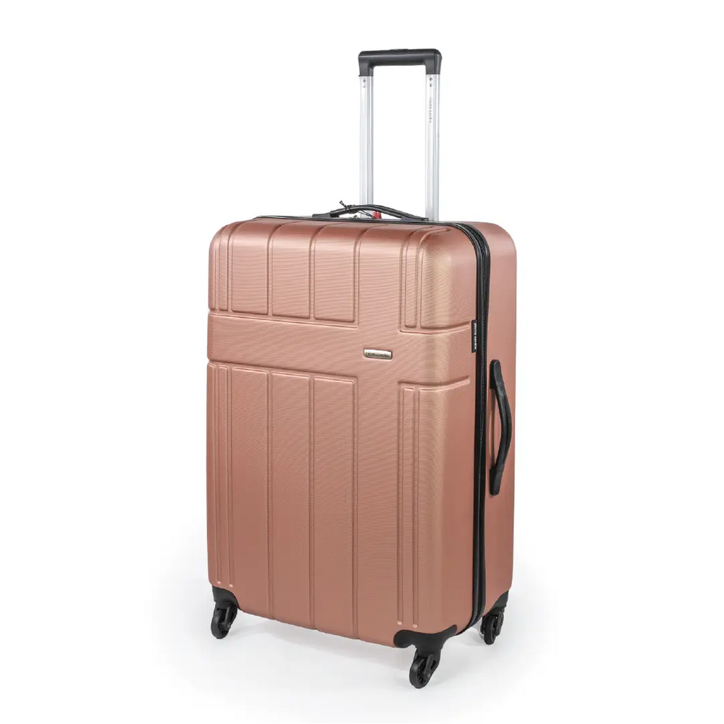 Rose gold suitcase with black handle and wheels on a white background
