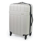 Gray suitcase with black wheels and handle on a white background