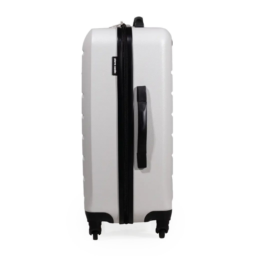 White suitcase with black handle and wheels on a white background