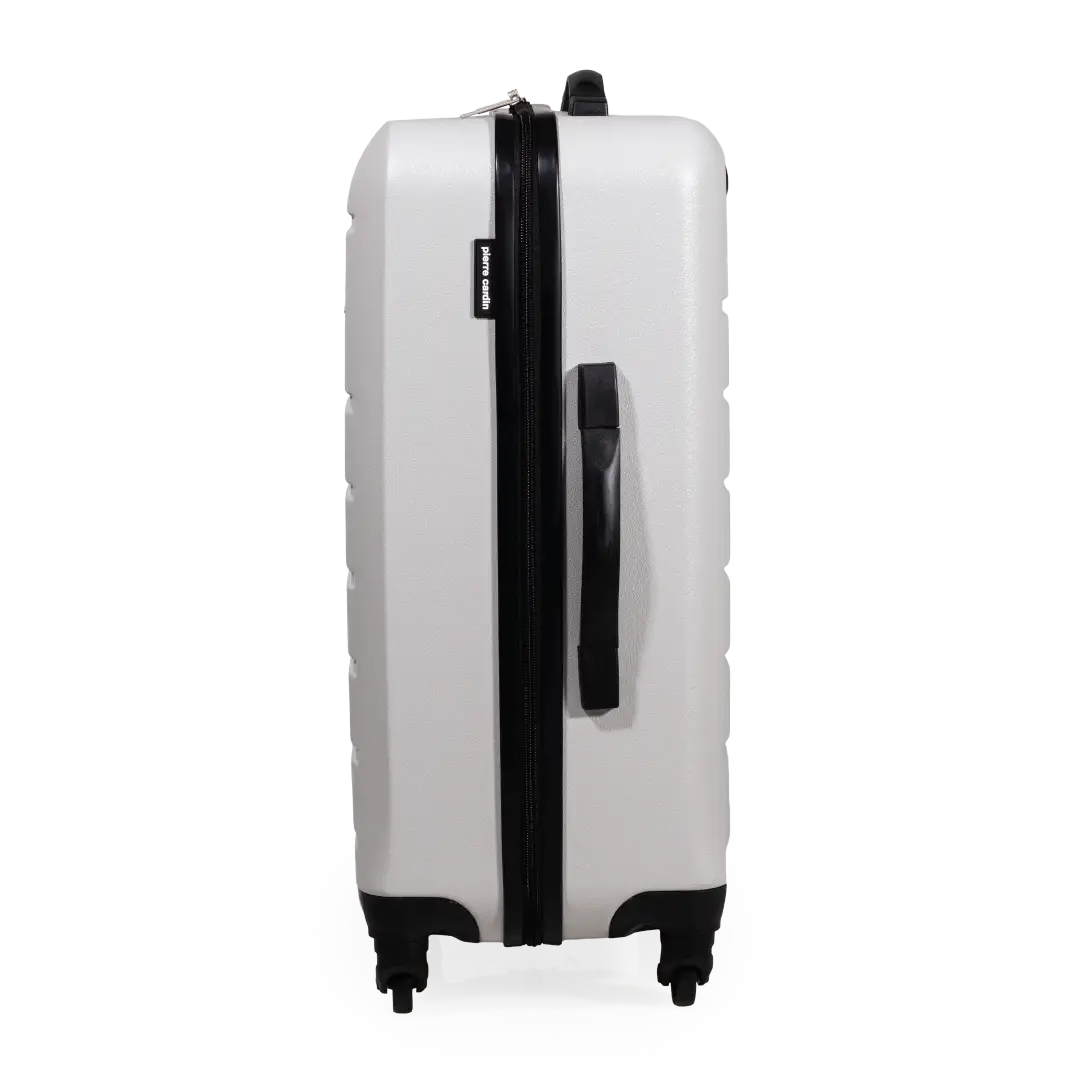 White suitcase with black handle and wheels on a white background