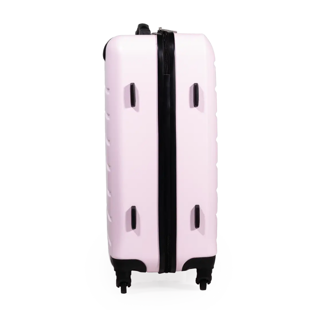 Pink suitcase with a black handle on a white background