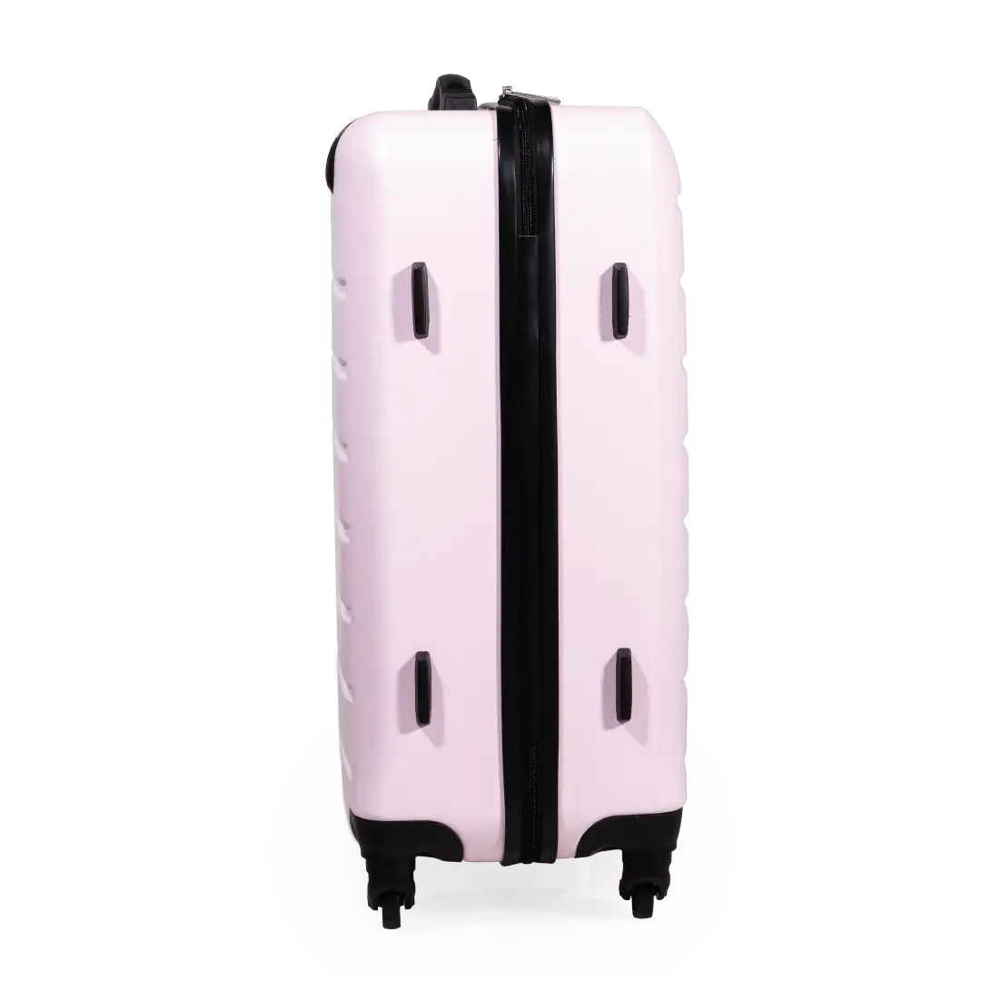 Pink suitcase with a black handle on a white background