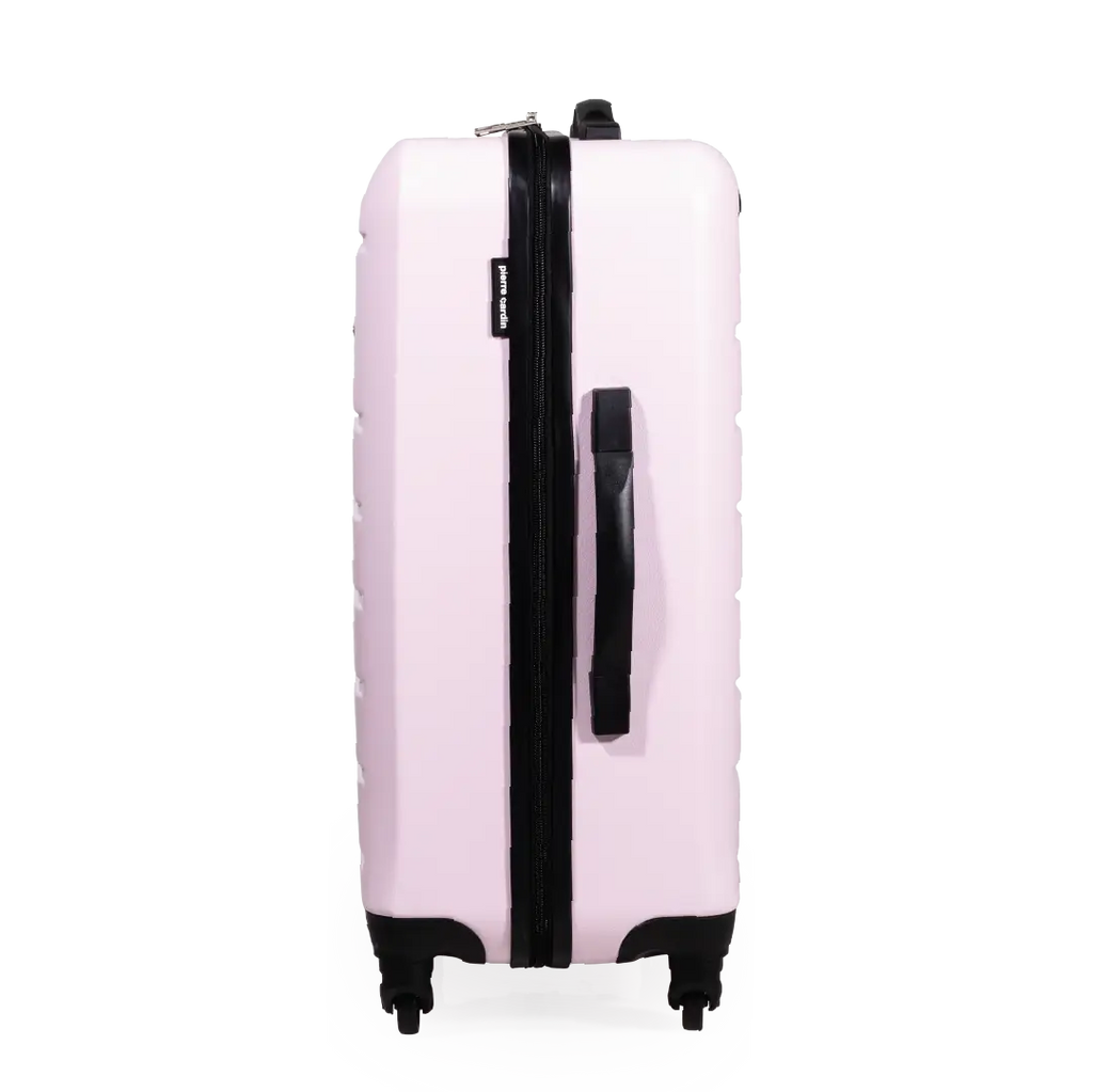 Pink suitcase with black handle and wheels on a white background