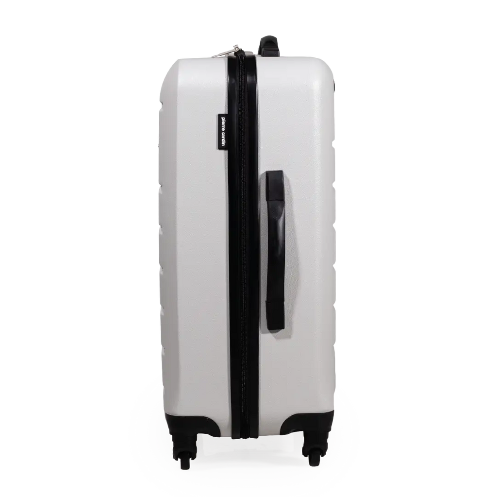 White suitcase with black handle and wheels on a white background