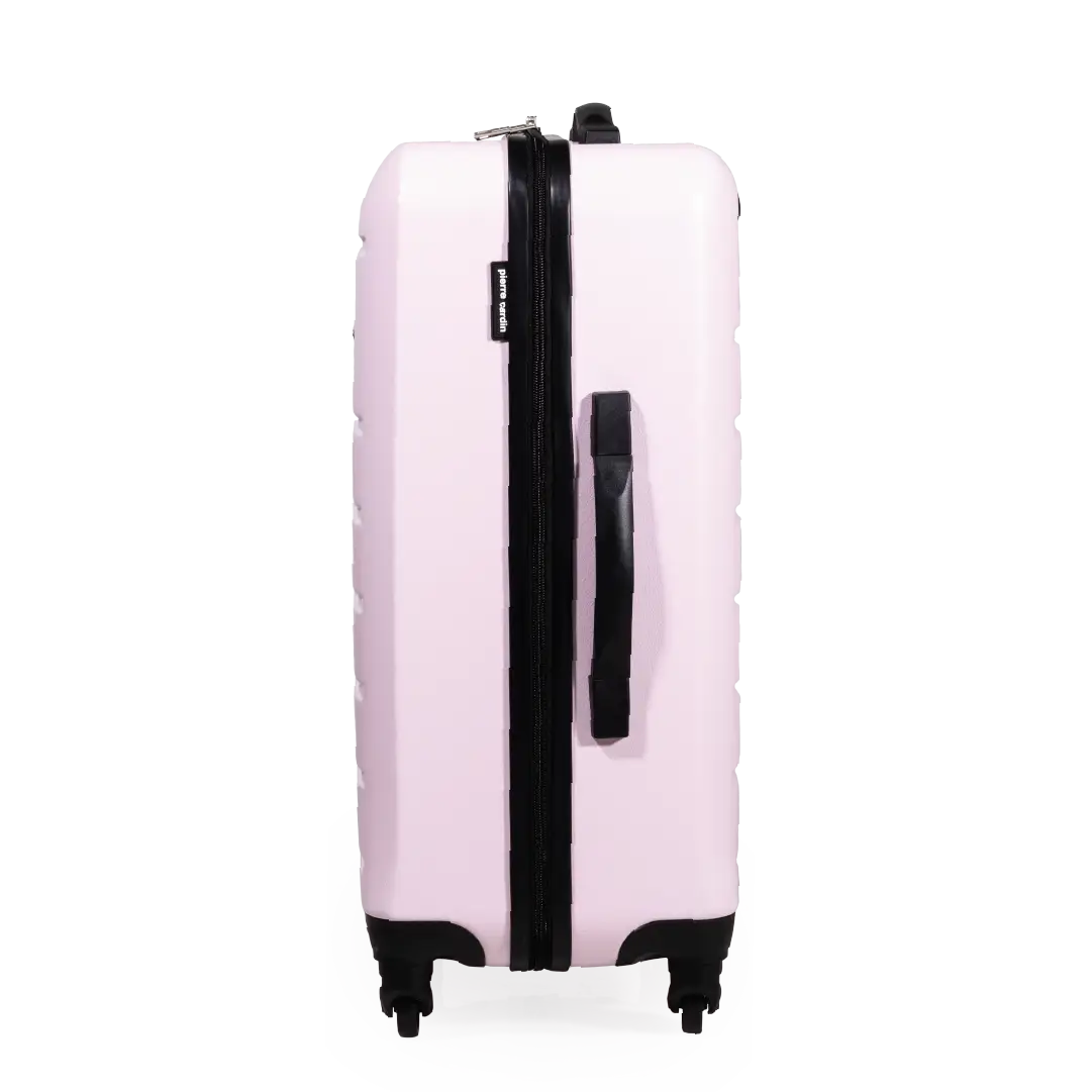 Pink suitcase with black handle and wheels on a white background