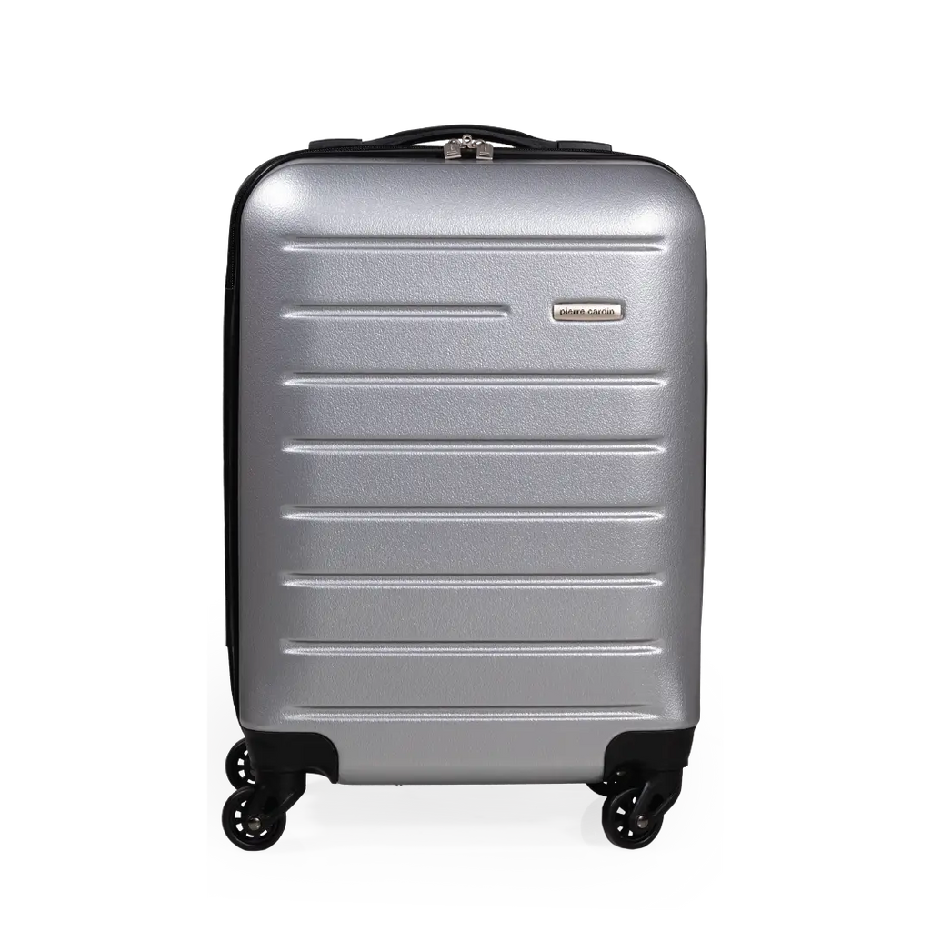Silver suitcase with black wheels on a white background