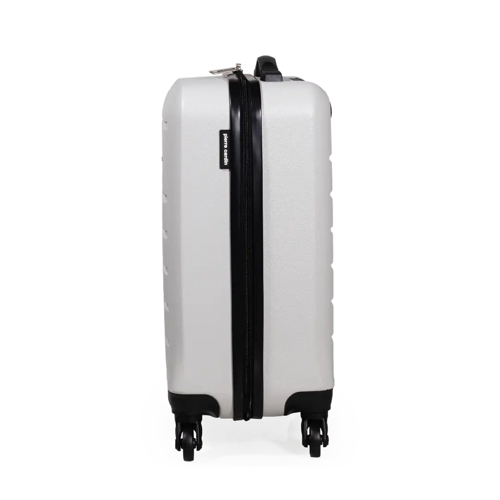 White suitcase with black accents on a white background