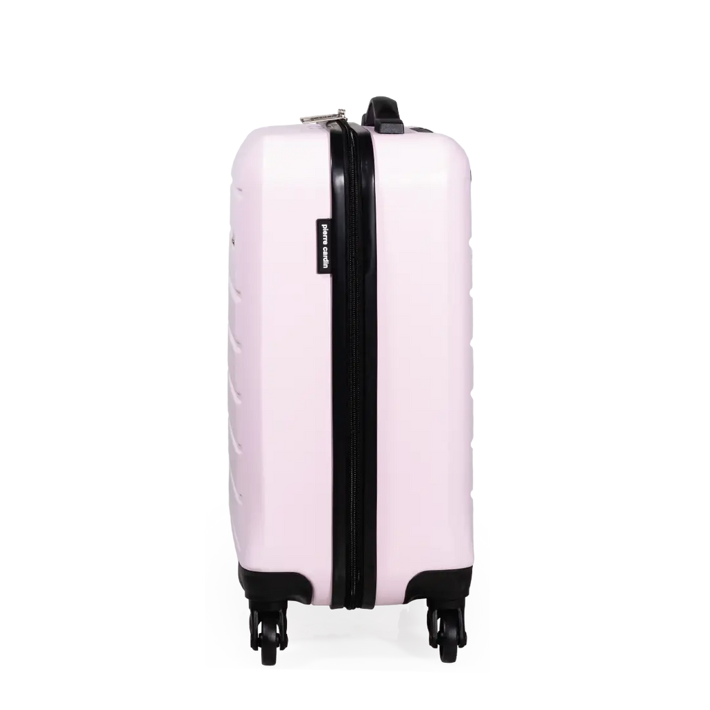 Pink suitcase with black handle and wheels on a white background