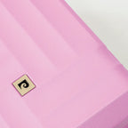Close-up of a pink fabric with a brand logo on a white background
