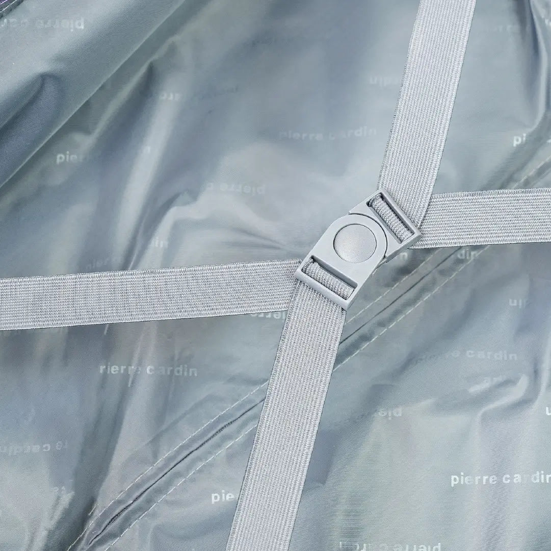 Gray suspenders on a textured fabric background