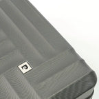 Gray textured suitcase with a brand logo on a white background