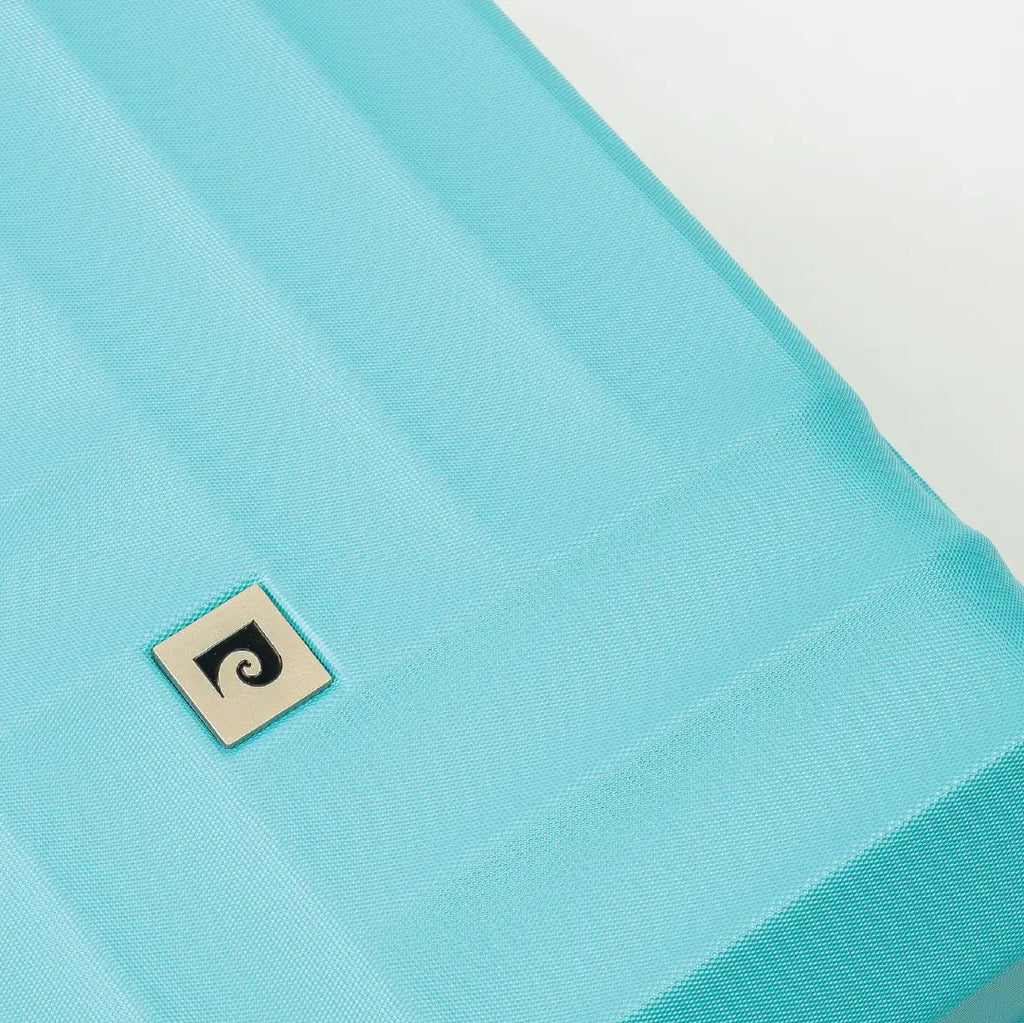 Outside of a blue hardshell suitcase