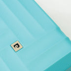 Outside of a blue hardshell suitcase