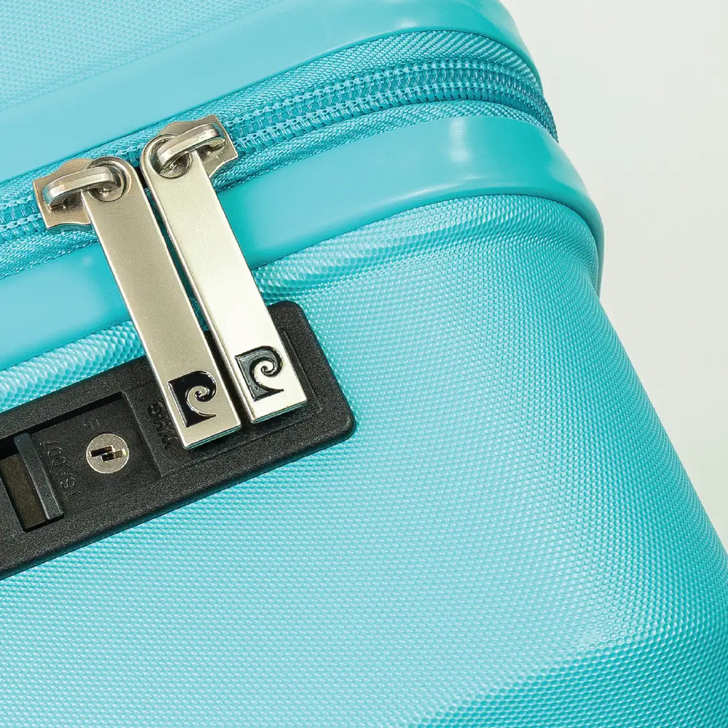 Zipper on a blue hardshell suitcase