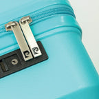 Zipper on a blue hardshell suitcase