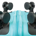 Bottom of a blue suitcase with black wheels