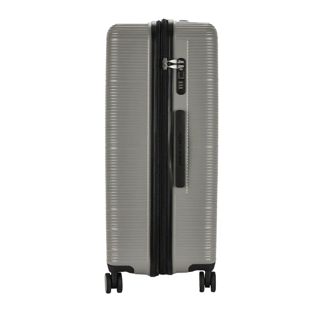 Silver suitcase with black handle and wheels on a white background