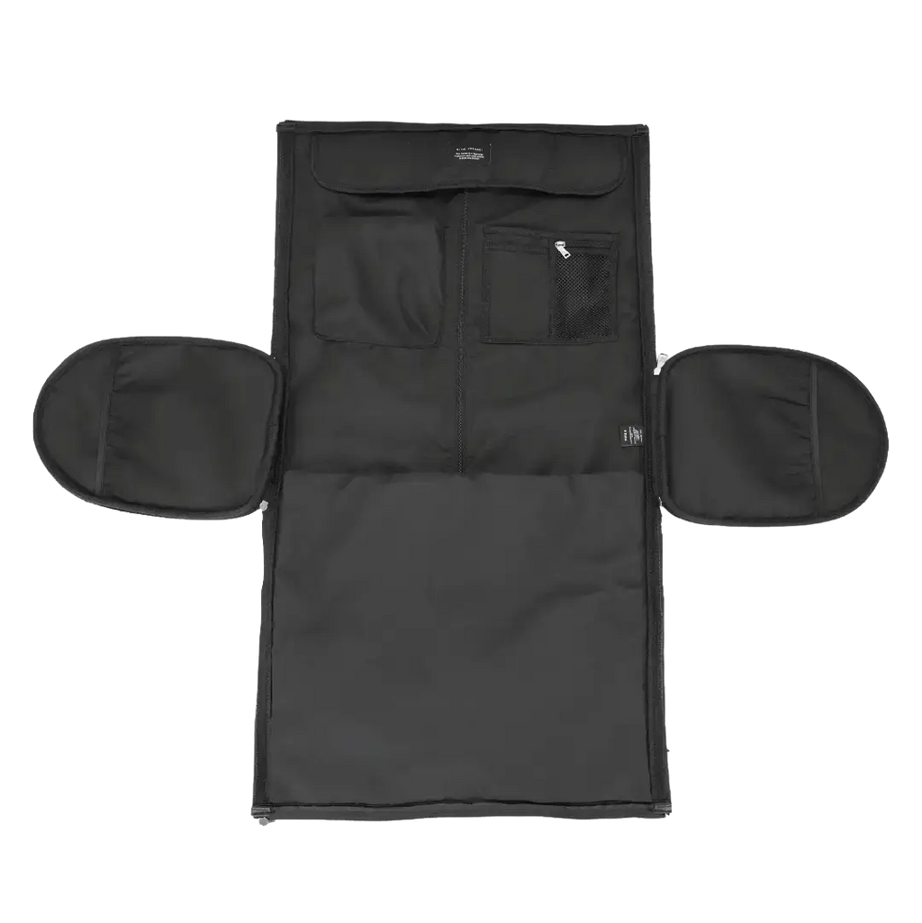 Black travel bag with multiple pockets on a white background