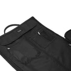 Black bag with multiple pockets and zippers on a white background