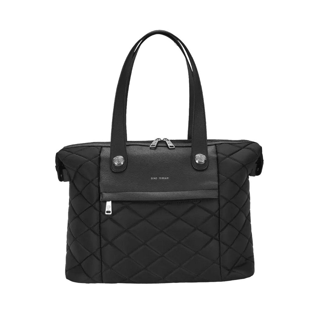 Black quilted handbag with silver hardware on a white background